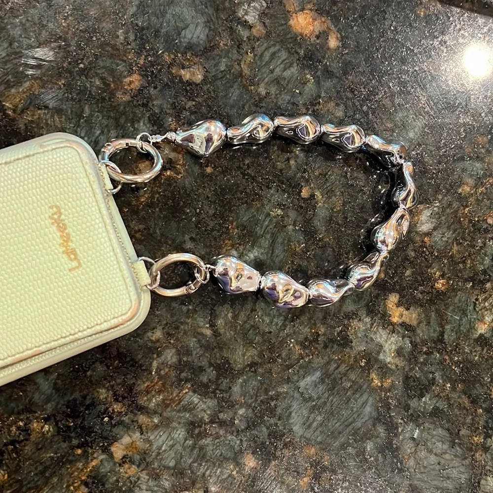 New, 2 interchangeable wristlets for phone case